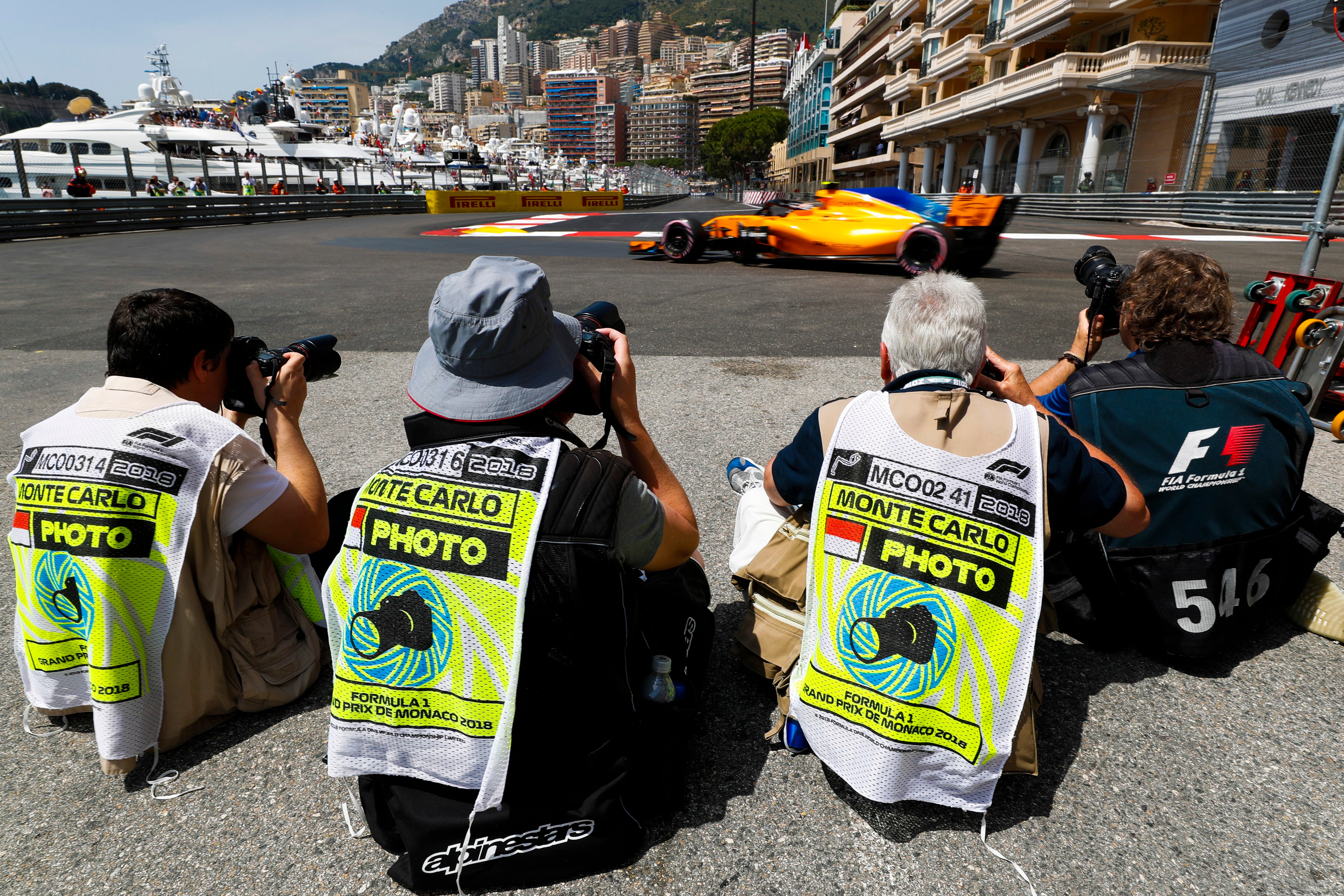 Photographers taking pictures of the race