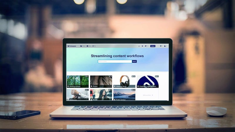 The Fotoware Veloz digital asset management system interface displayed on a laptop screen