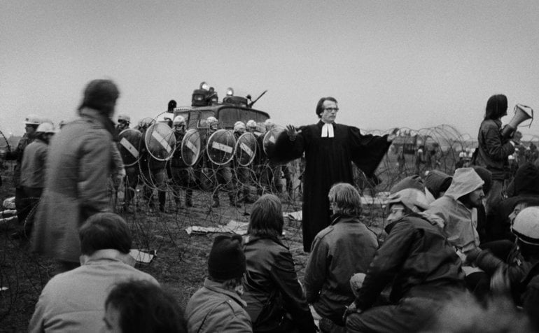 During a violent anti-nuclear power demonstration, Pastor Bode of Bremen tries to keep demonstrators