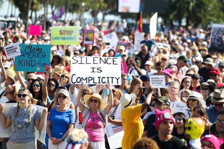 St. Petersburg, Florida, January 21, 2017: Demonstrators rally at Demens Landing Park before the Women's Solidarity March St. Pete in downtown St. Petersburg. St. Petersburg Police said 20,000 participated in the event, which made this sister event to the Women's March on Washington the largest demonstration ever held in St. Petersburg.