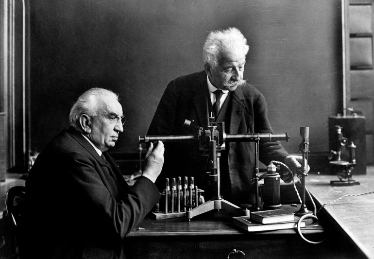 Early film makers, Auguste (1862-1954) and Louis (1864-1948) Lumiere in their laboratory.