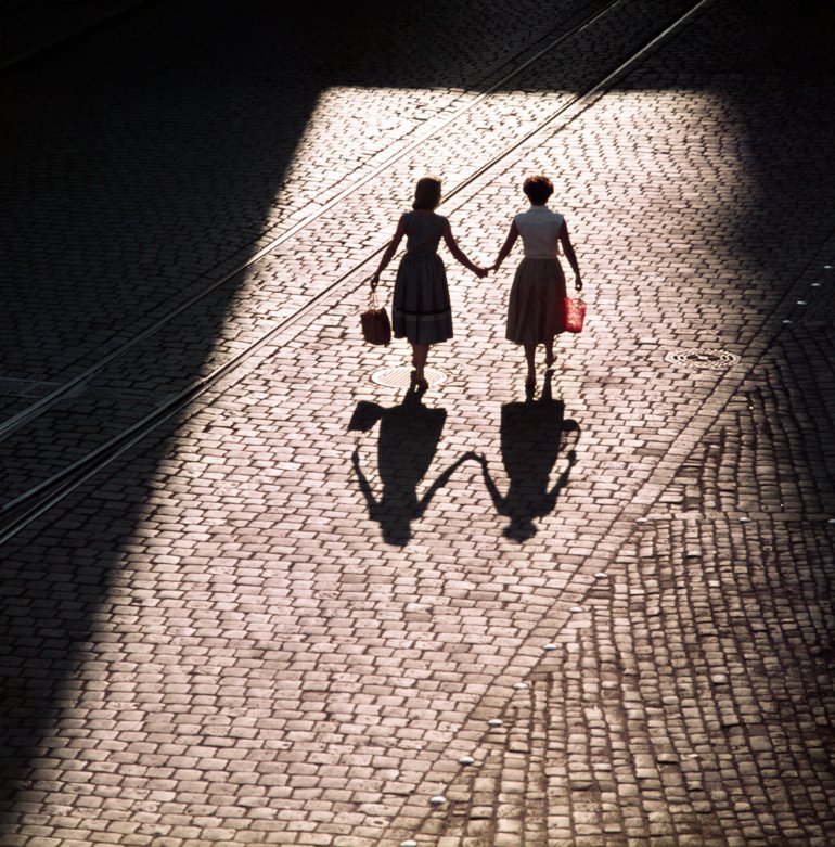 Bavaria, Regensburg, Germany: Two woman walking hand in hand. 01.07.1955 MR