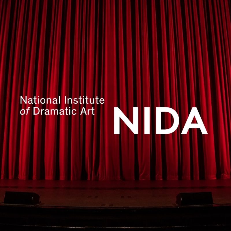 Customer Story NIDA: Background: red theatre curtains